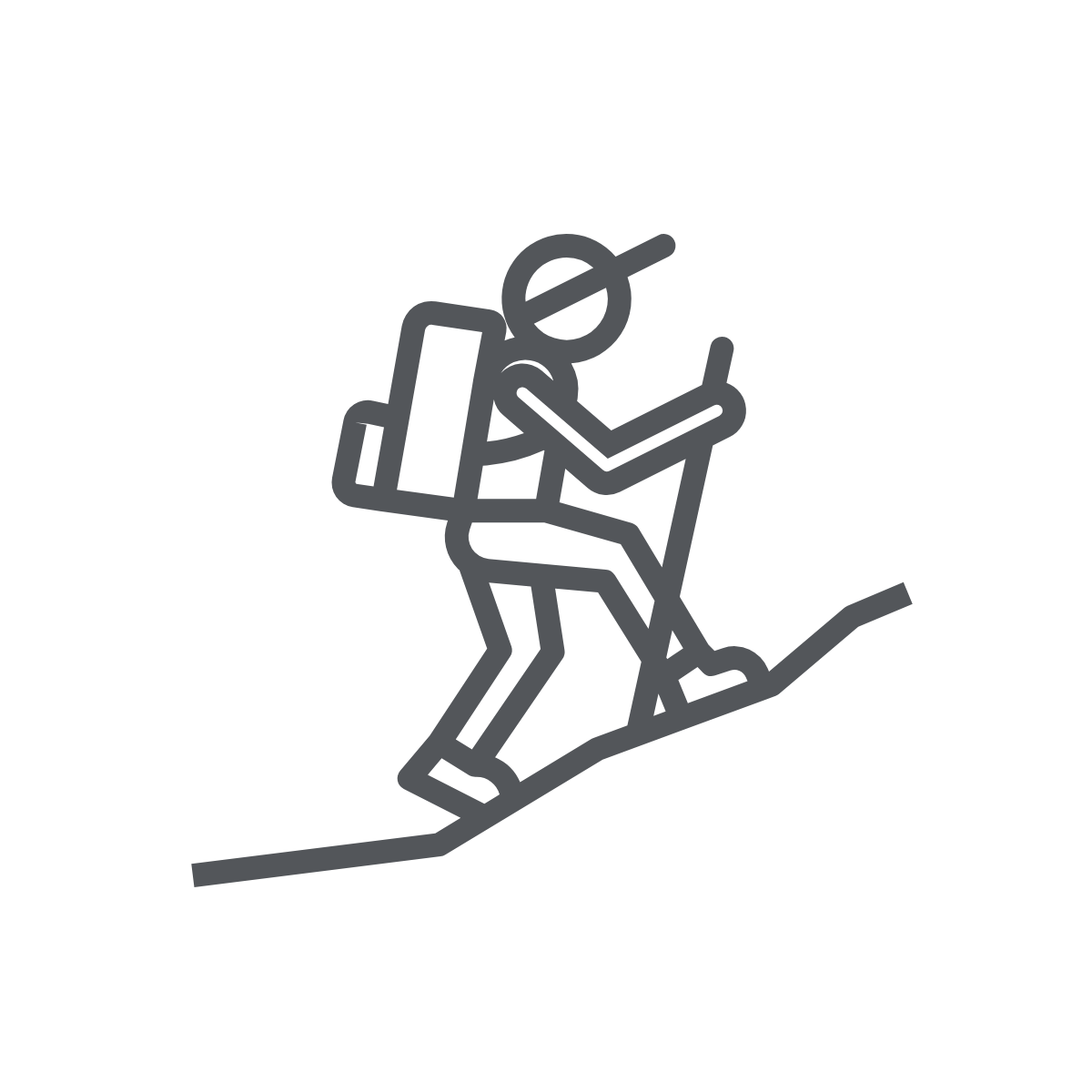 A grey icon of a person hiking up a hill with hiking gear. 