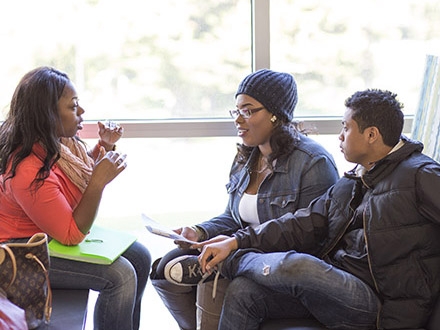 Students talking in the Library